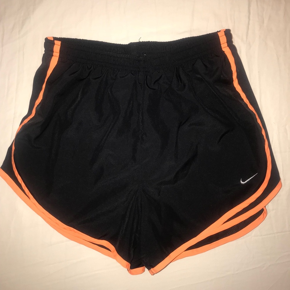 Black and orange Nike shorts